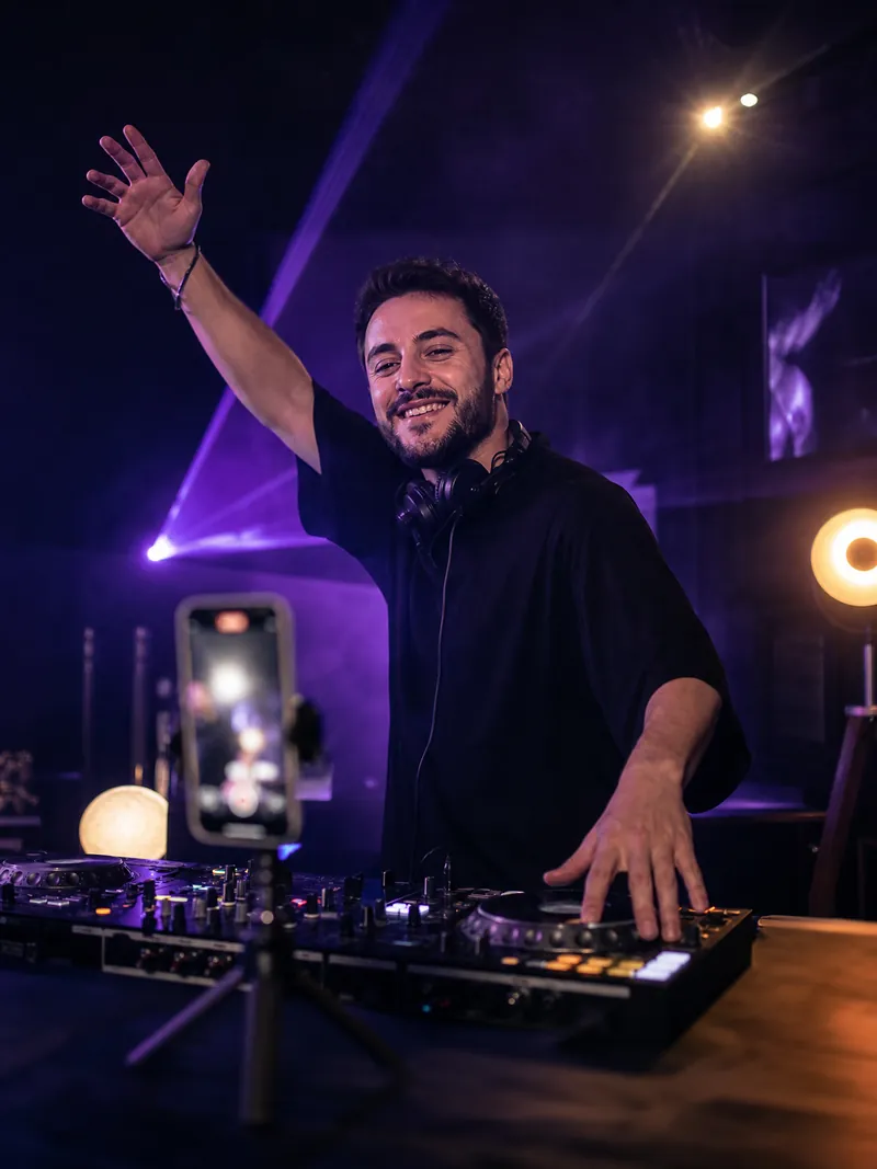 A DJ streaming a LIVE set from a home studio